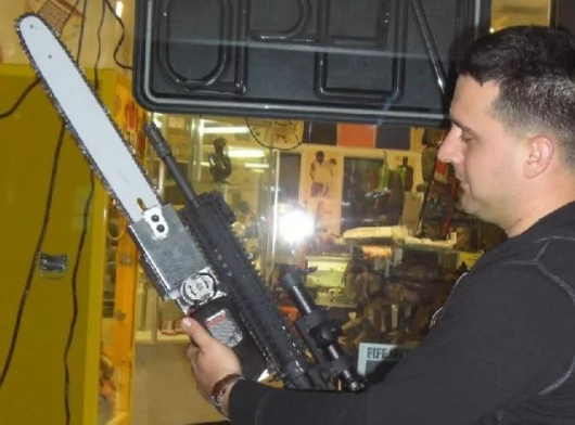 The AR-15 with chainsaw bayonet