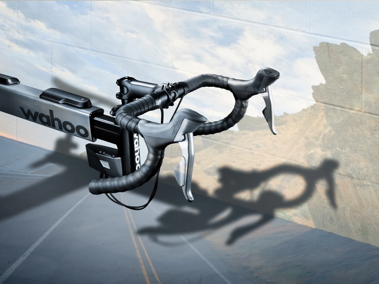 Utilizing their own handlebars, Kickr Bike users can shift "gears" on the trainer