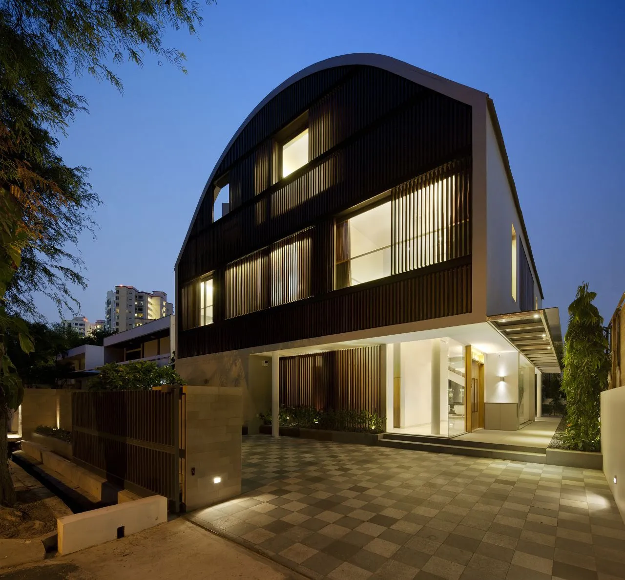 The north and south facades feature timber screens which perform multiple functions (Photo: Jeremy San)