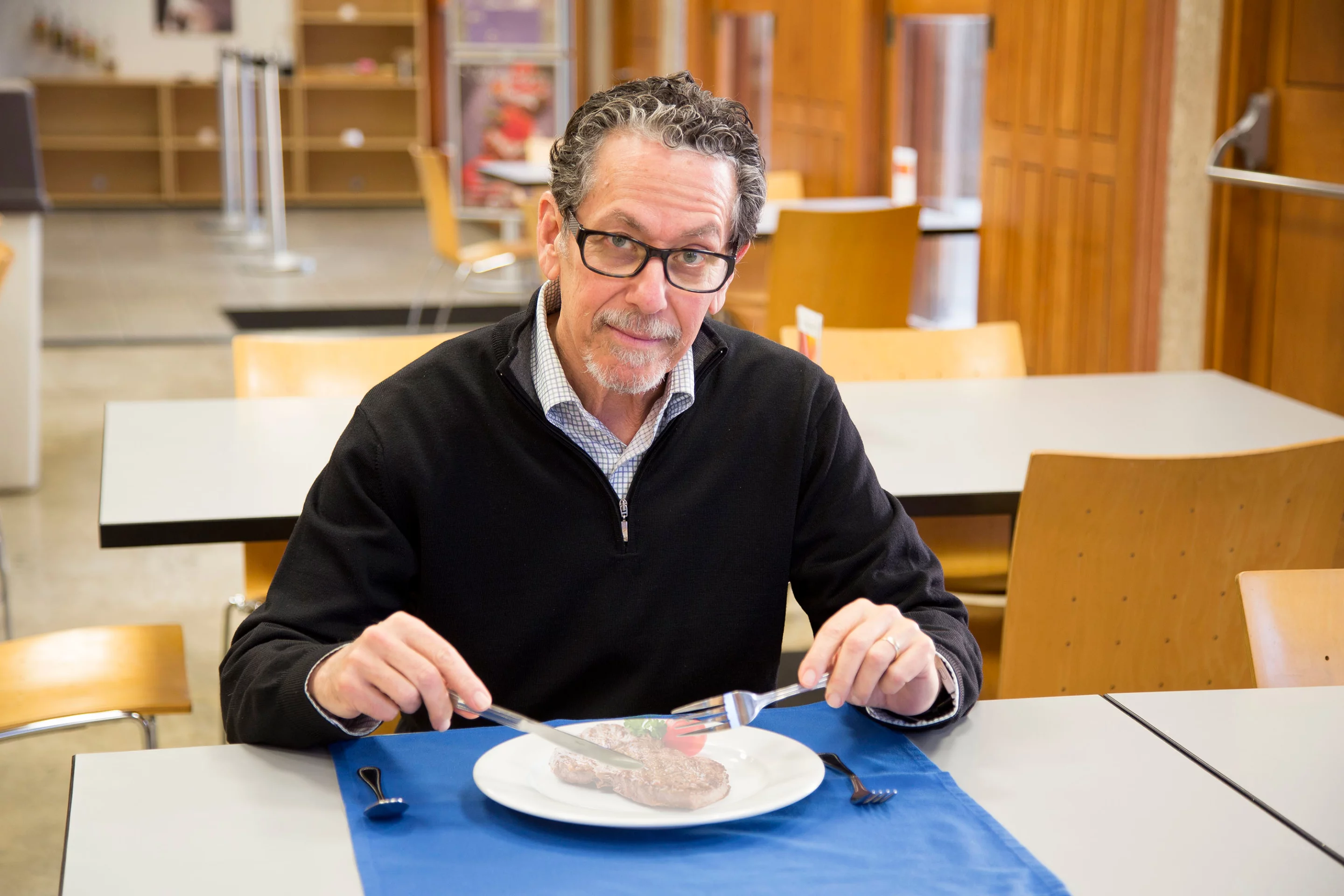 Lead scientist Ronald Evans consuming an "imaginary meal," of the type that fexaramine could cause the body to believe is being consumed (Photo: Salk Institute for Biological Studies)