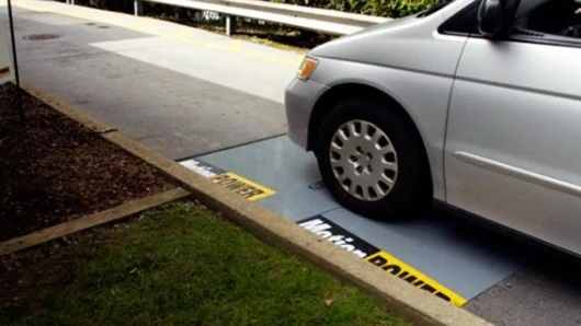 The original MotionPower prototype undergoing testing at a Burger King drive-thru