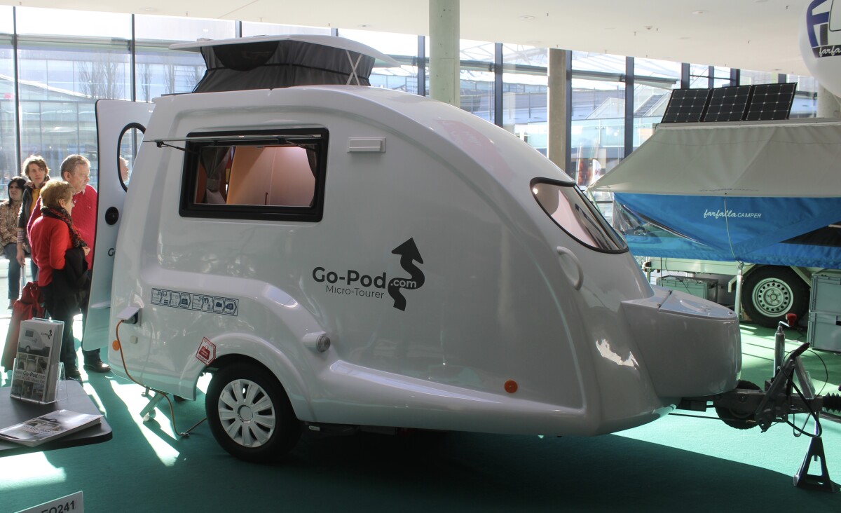 The Go-Pod features a single-piece fiberglass body, small pop-up roof and two-sleeper cabin
