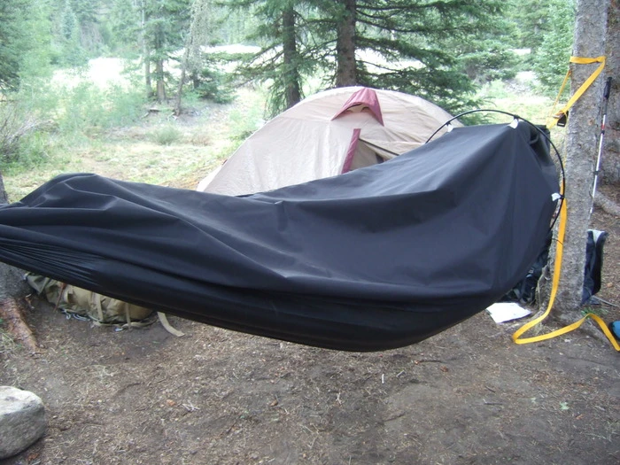 The Alpine Hammock is a lightweight, two-in-one shelter for backpacking and mountaineering