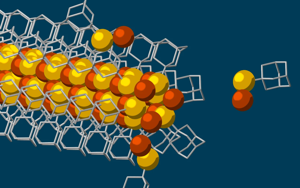 An illustration showing the molecular cage of diamondoids self-assembling around the nanowire core