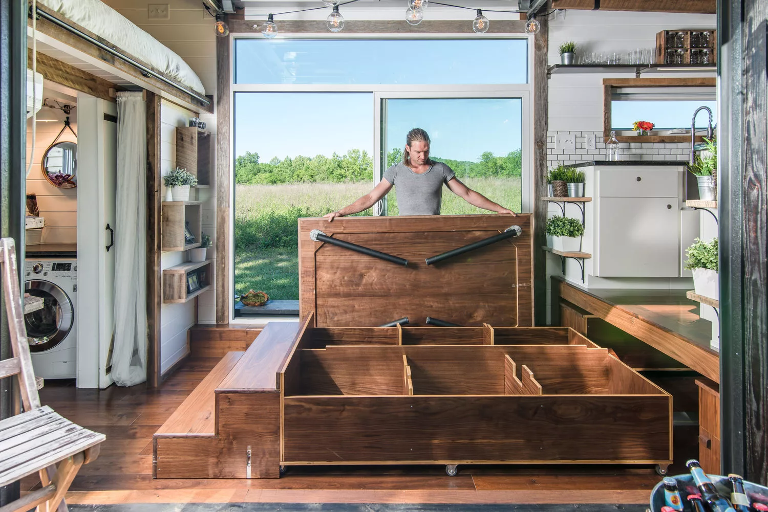 Pulling out the large eight-person dining table and bench seats