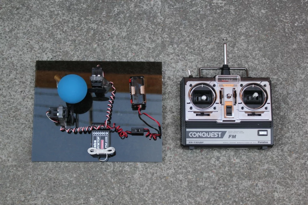 An early test rig shows the three-motor drive system in operation