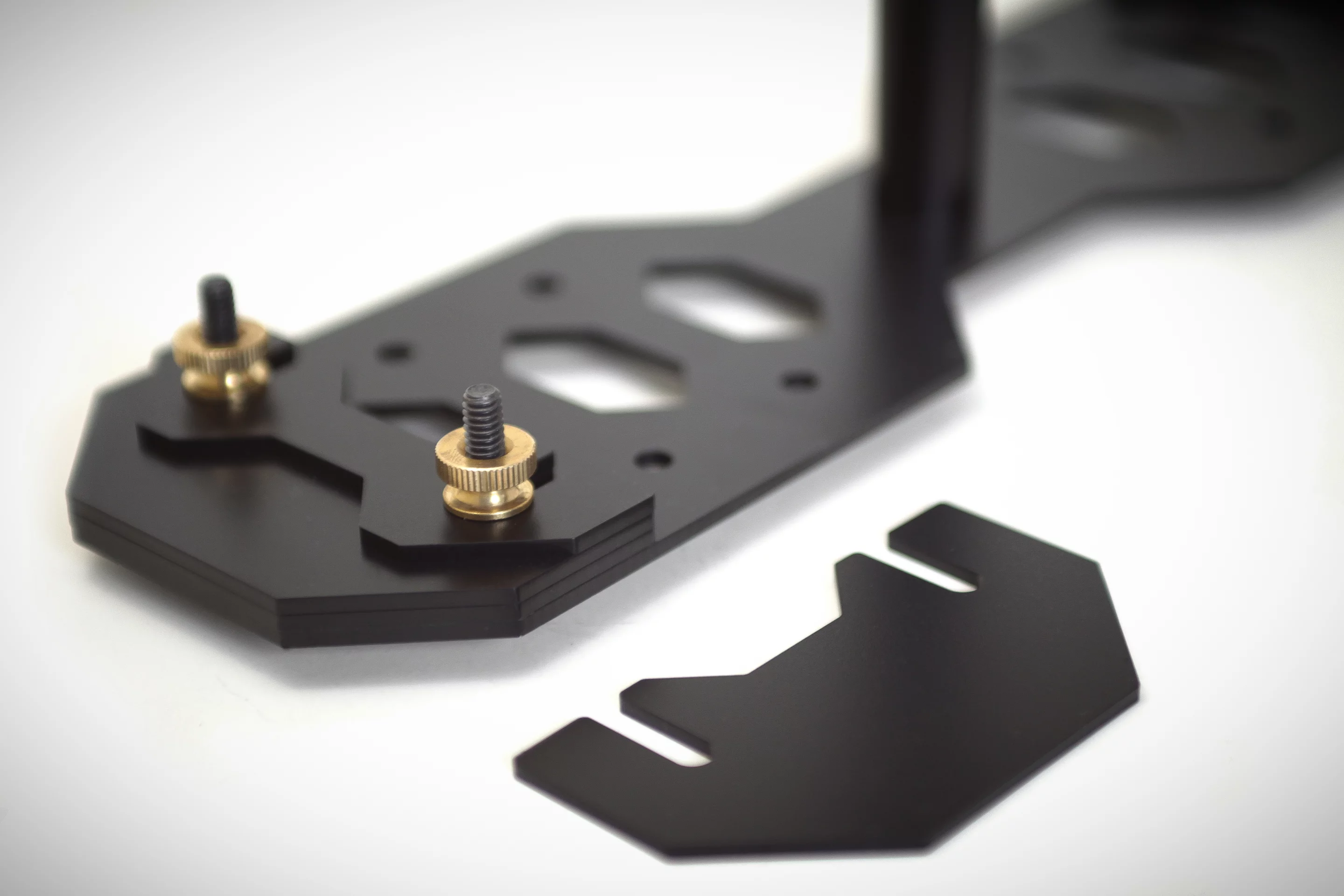 The Supraflux Stabilizer uses two sizes of slide-out counterweights