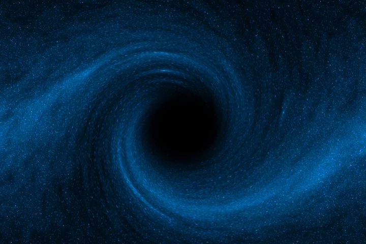 Astronomers are suggesting that the radiation and winds from supermassive black holes at the center of galaxies halts star generation within the galaxy (Image: Shutterstock)