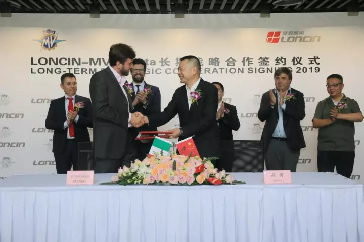 MV Agusta CEO Timur Sardarov (L) and Loncin president Yong Gao (R) shaking on their new agreement to build small-capacity MVs for the Chinese market