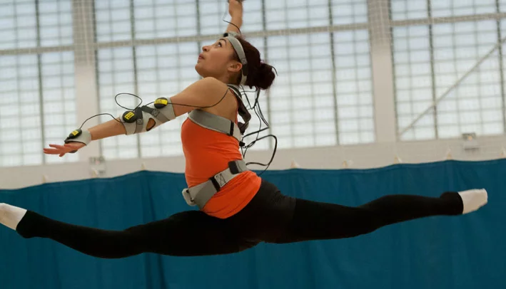 U.K. Olympic hopeful Mimi Cesar using the MotivePro vibrating suit to help perfect her rhythmic gymnastics routine
