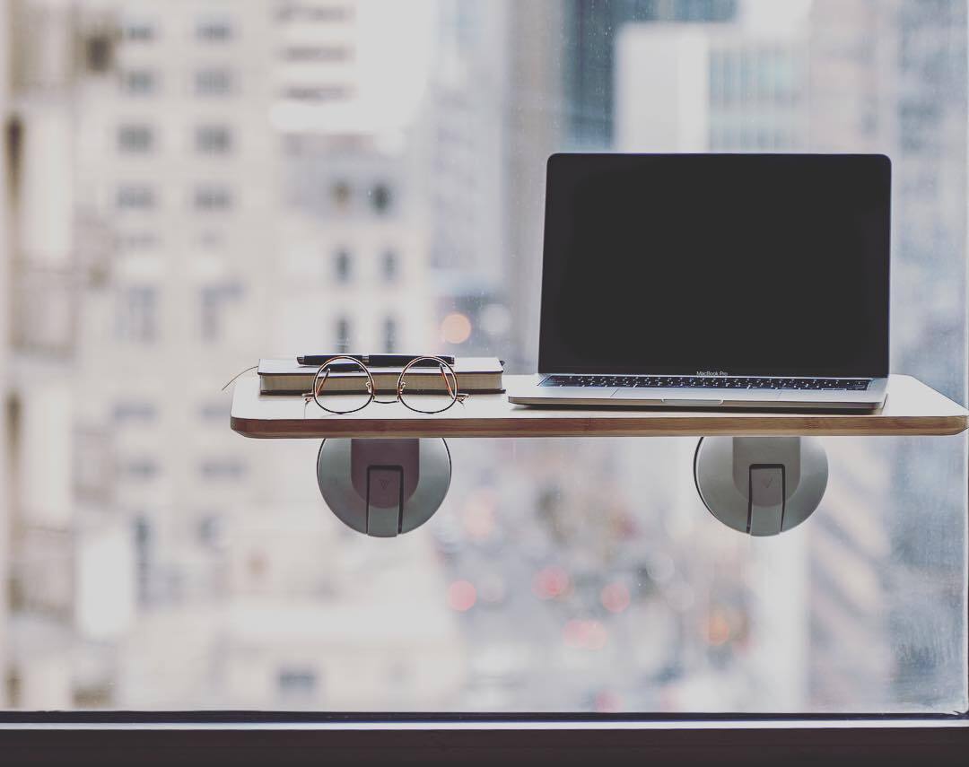 Suctioncup standing desk is an instant office with a view