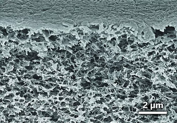 Scanning electron micrograph of the nano-sized cell structure of NASA's new polymer aerogel. The average cell size is about ten nanometers (Photo: NASA)