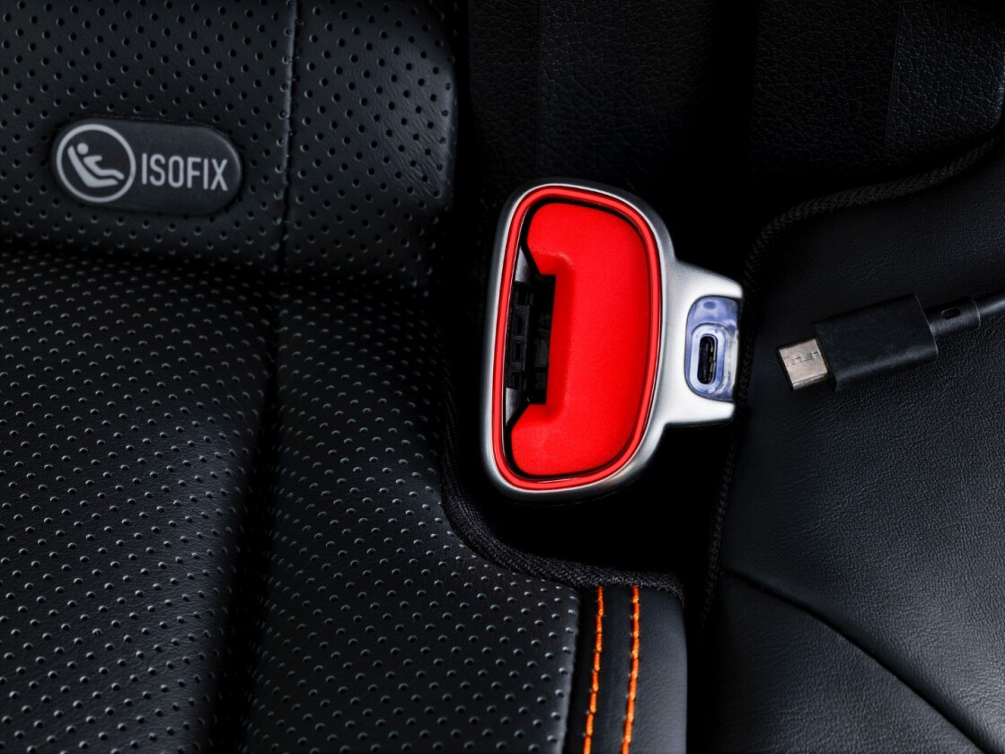 USB cables in the seat let passengers interface with the car's audio system and charge devices - but only when the seatbelts are clicked in