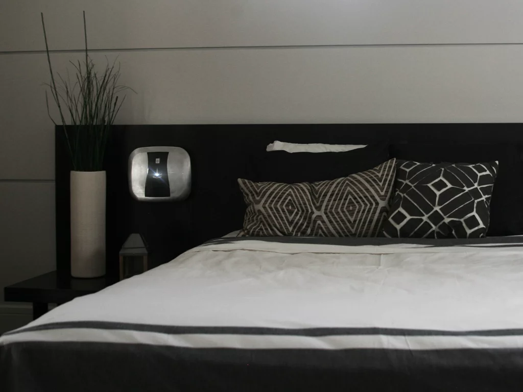 The locking mechanism uses motorized servos rather than magnets, which allows the safe to open at any angle or orientation, so it can be mounted to a wall or underneath a desk if needed