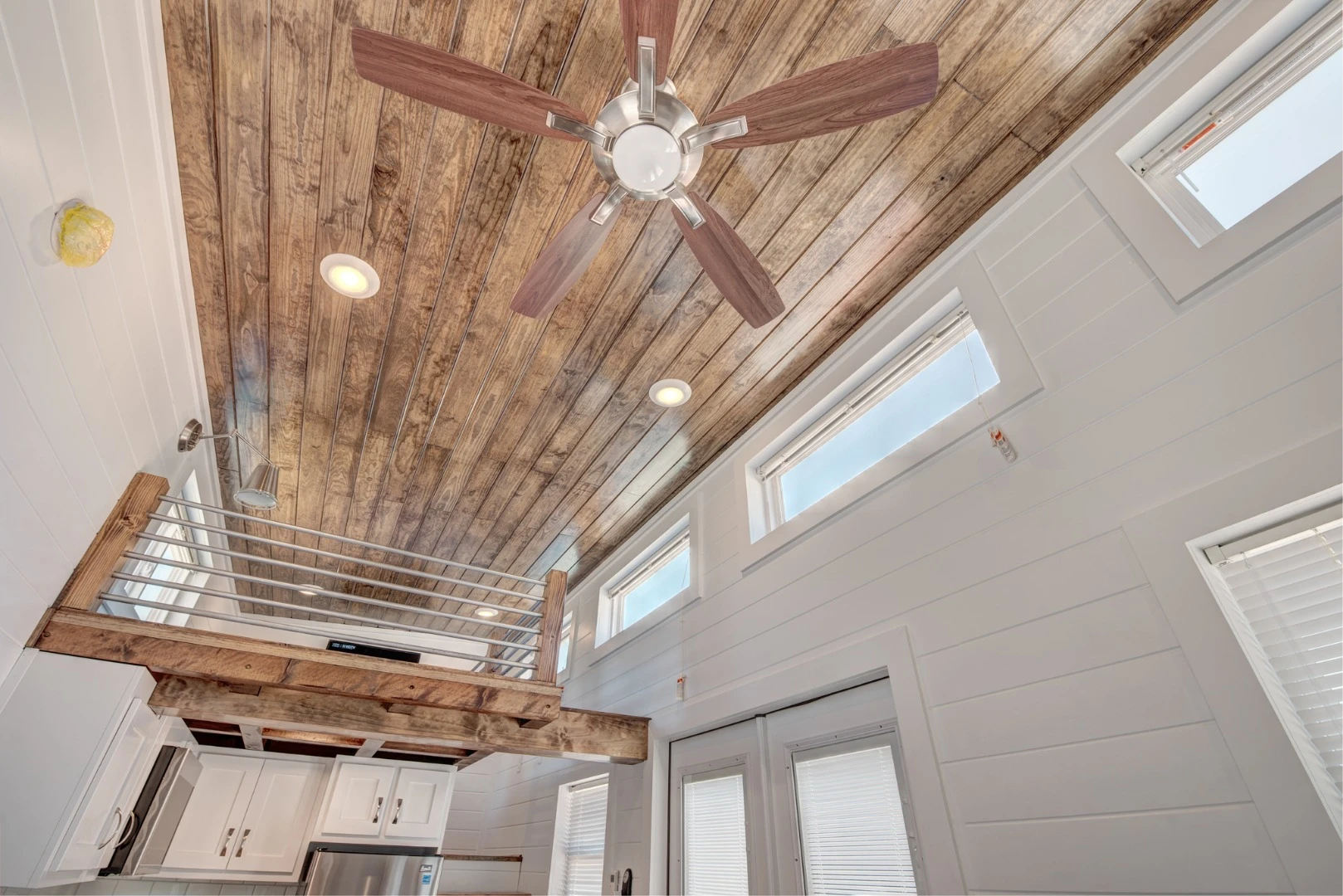 Lofts have become an almost essential component of tiny house living, but few offer the headroom of the recently completed Journey by Alabama Tiny Homes