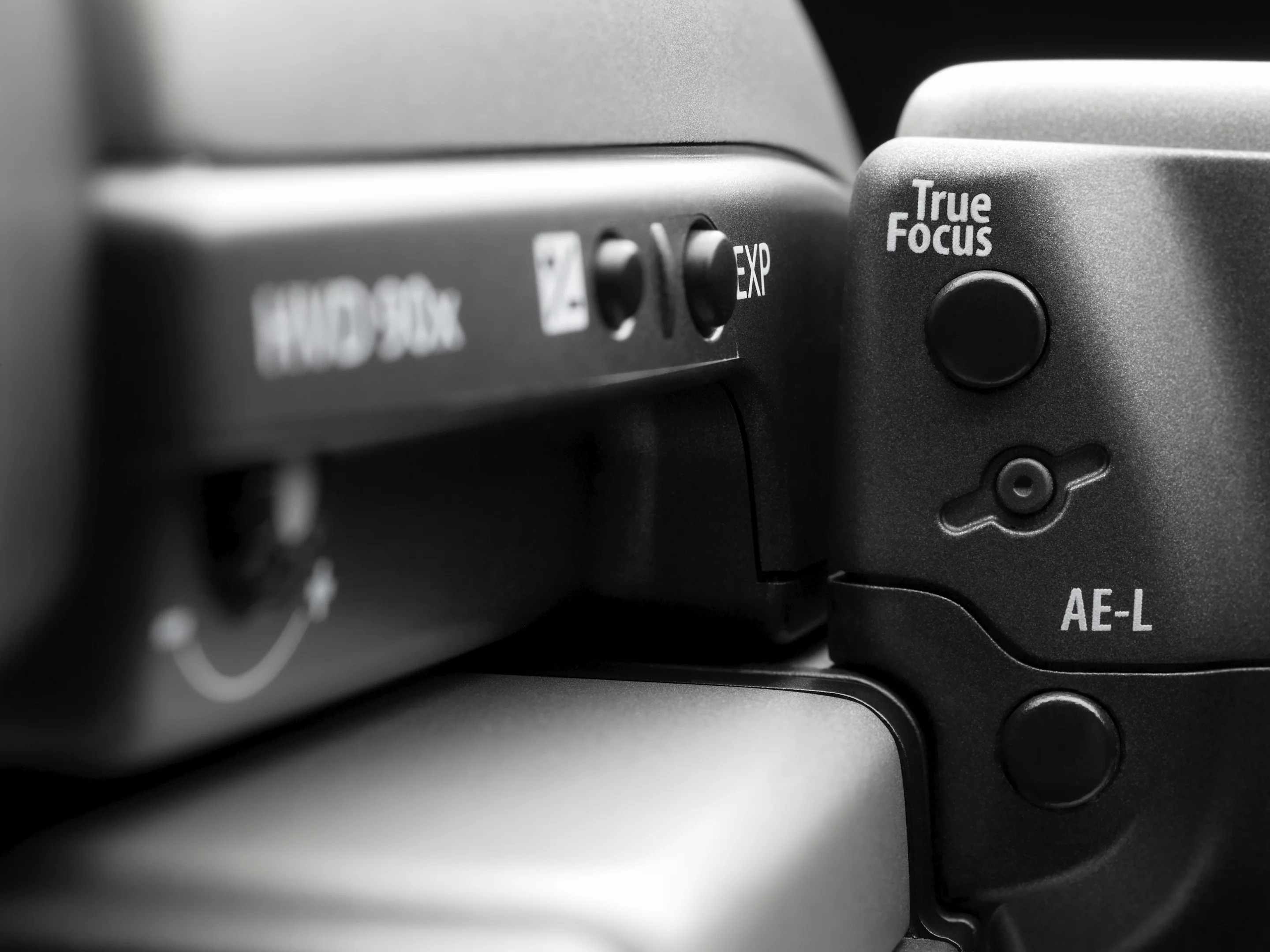 Close up showing the system's True Focus activation button