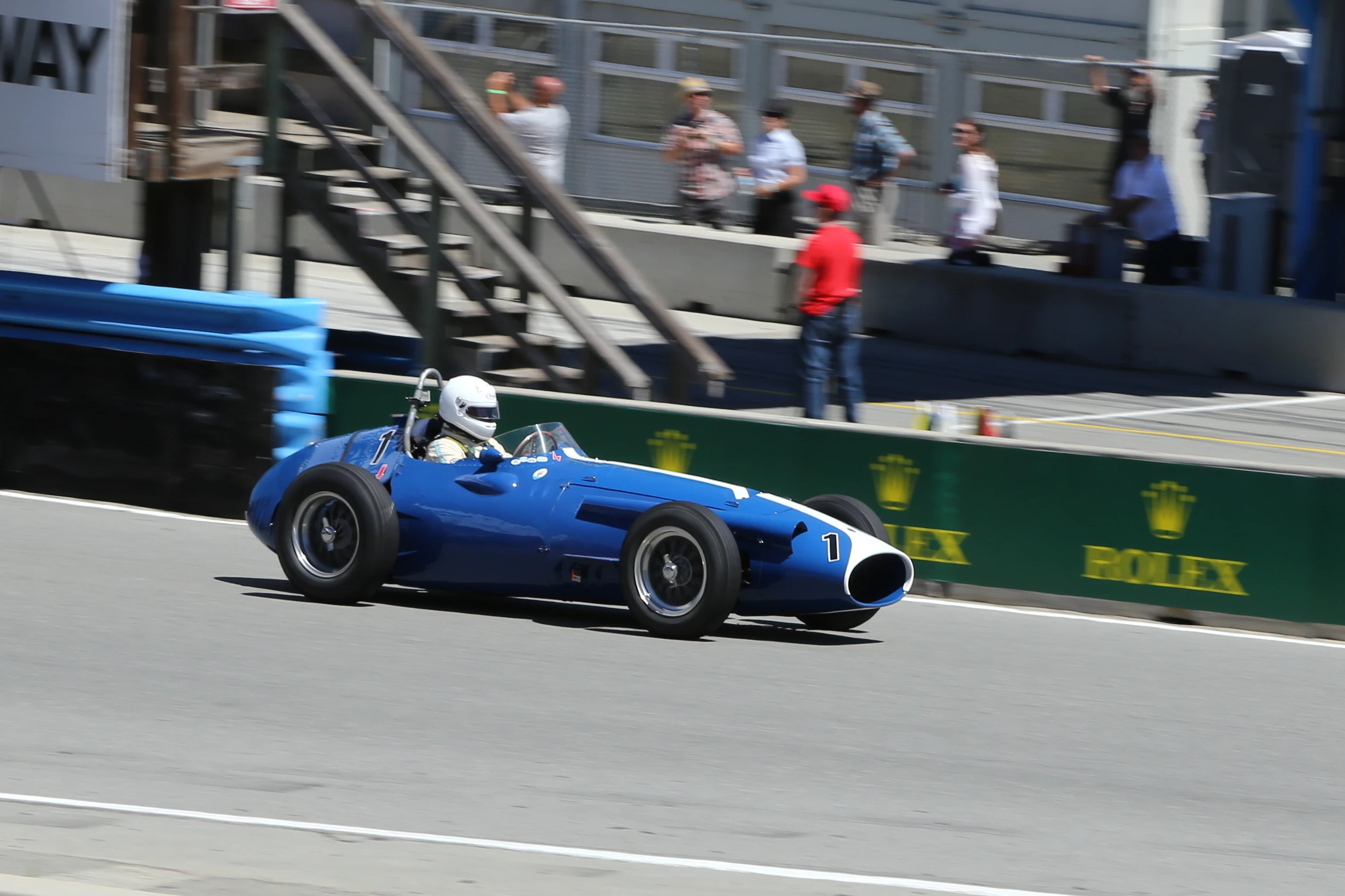 A blue Maserati 250F enjoys the lead during its series at the 2014 Rolex Monterey Motorsports Reunion (Photo: Angus MacKenzie/Gizmag.com)