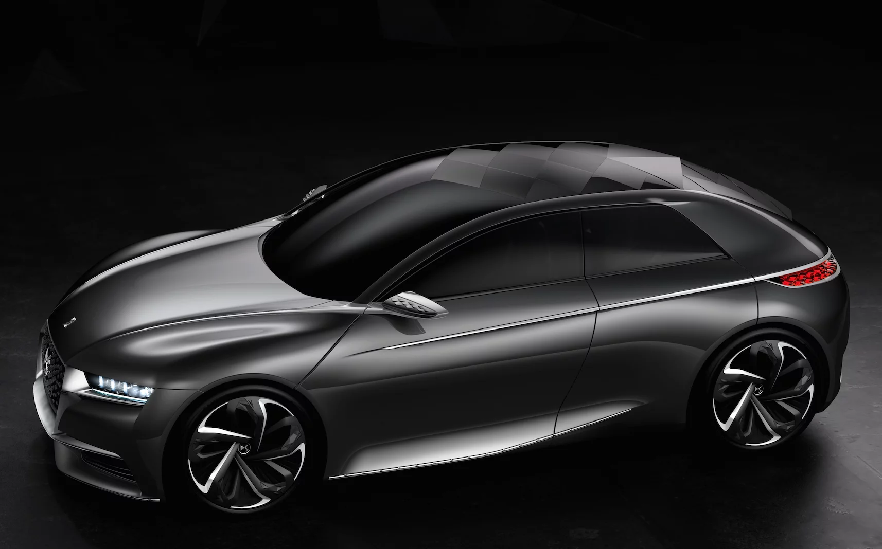 The DS' roofline is low, which accentuates the car's length