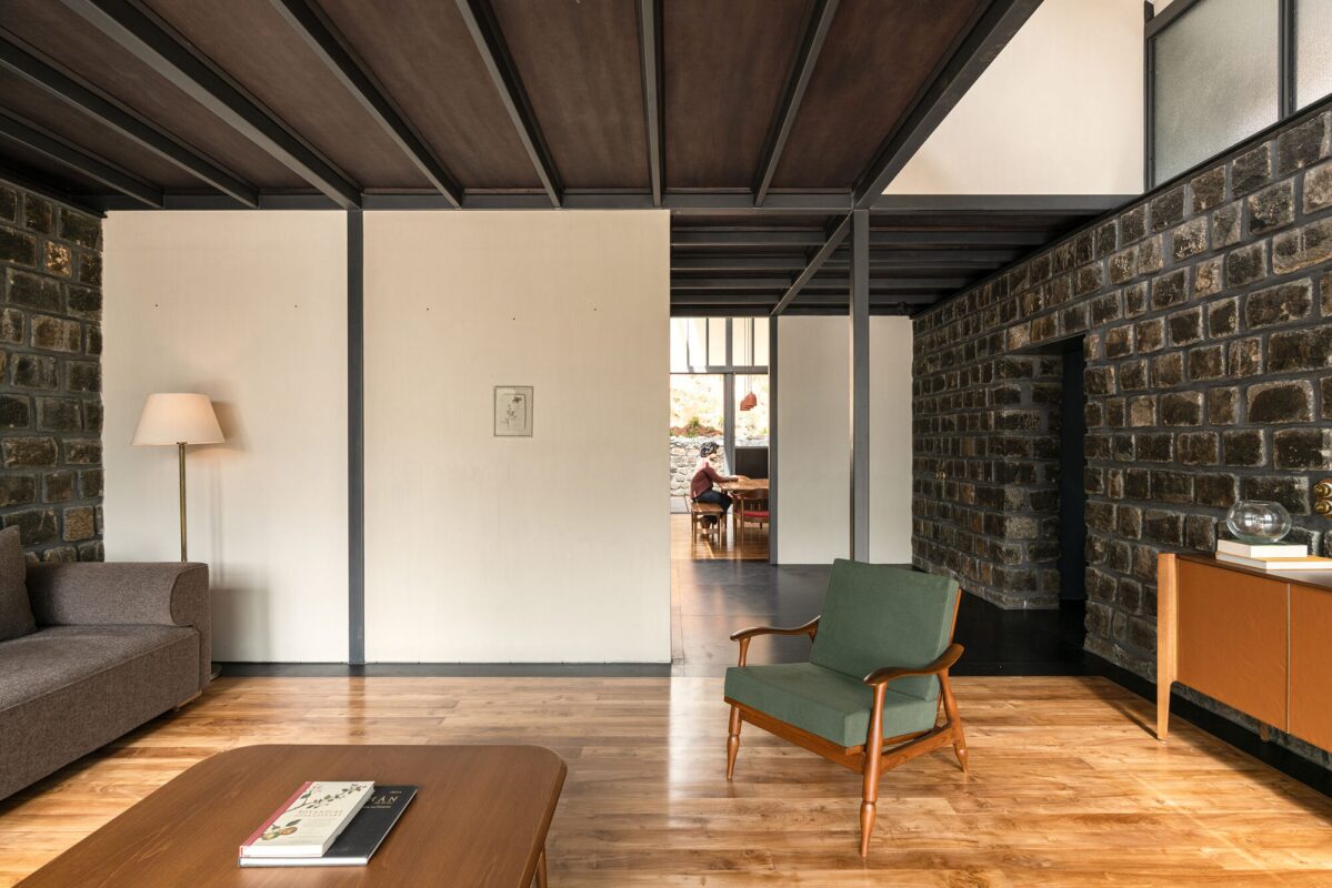 Beautifully rustic mountain house rises from its colonial-era grave