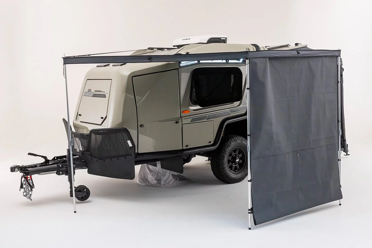 The over-galley 270-degree ARB awning stores away in a side cabinet for flush, aerodynamic performance and aesthetics