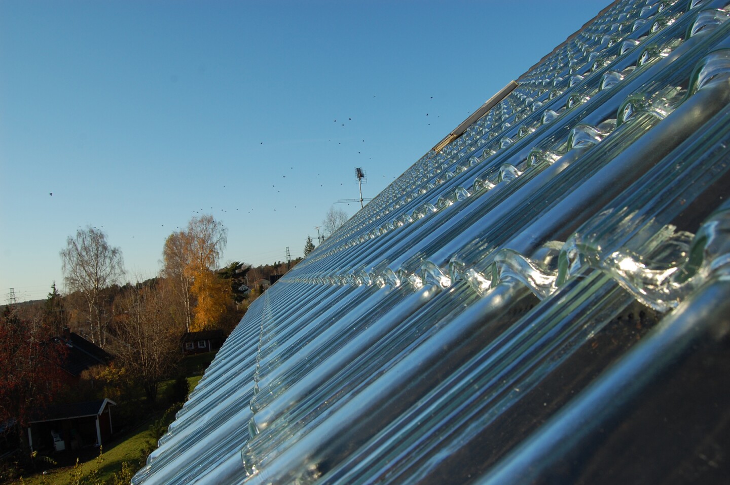 Glass roof tiles let a little sunshine in to cut heating bills