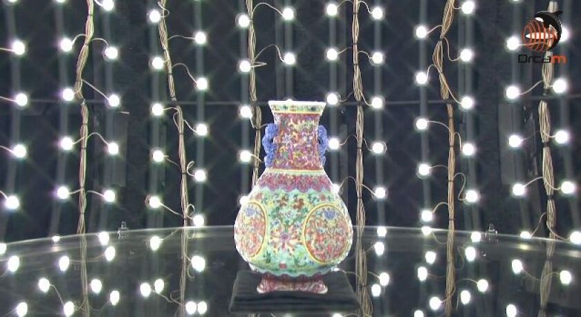 A matrix of lights within the OrcaM's sphere illuminate the object