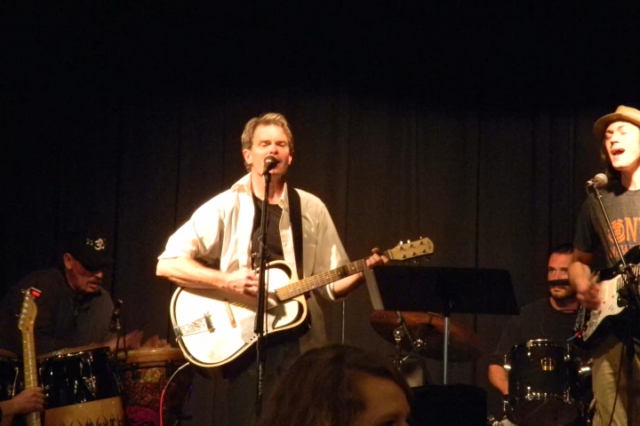 Guitarist Mike Rowell plays the Bouillez acoustic