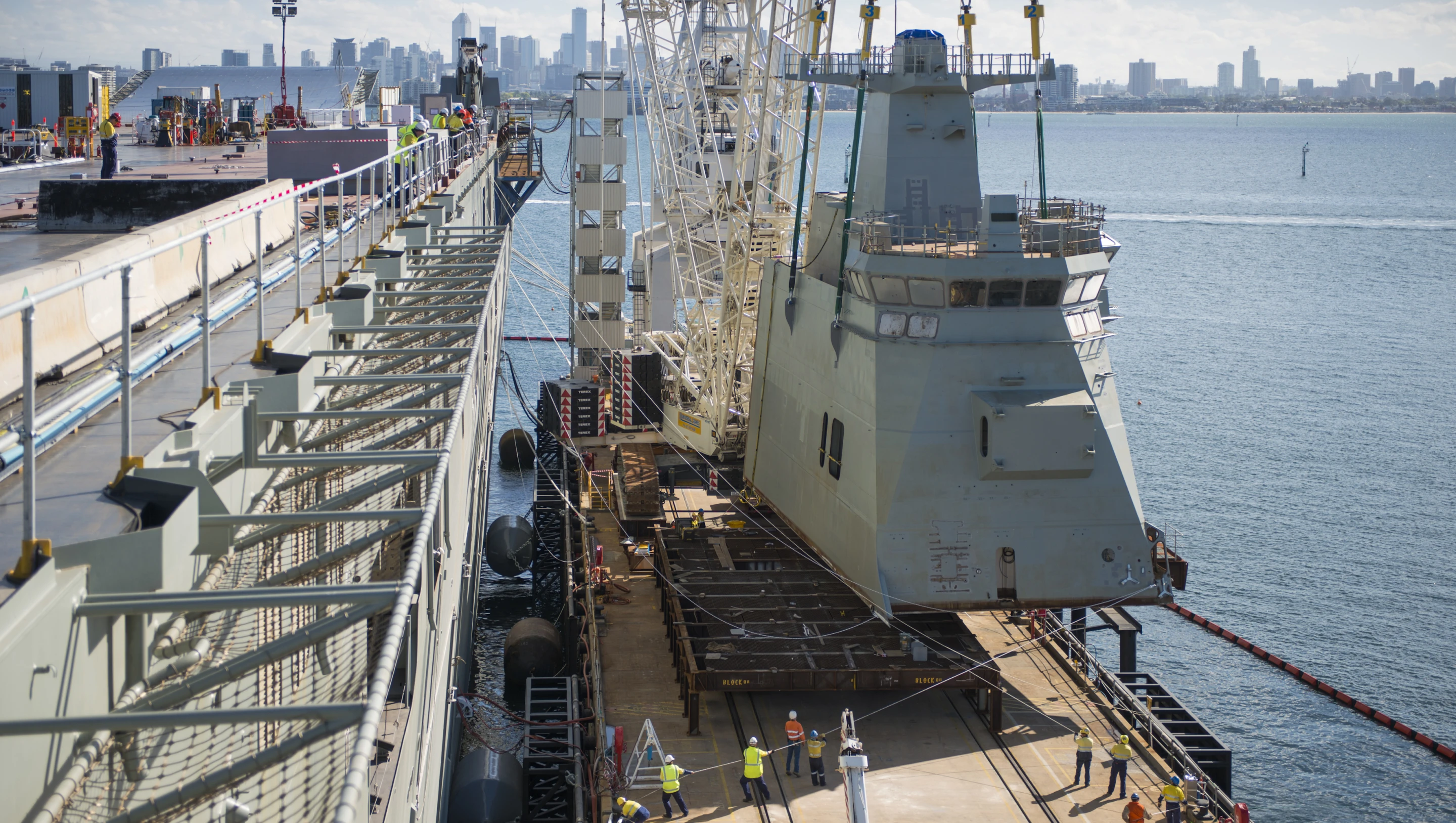 Raising superstructure module from dock (Photo: BAE Systems)