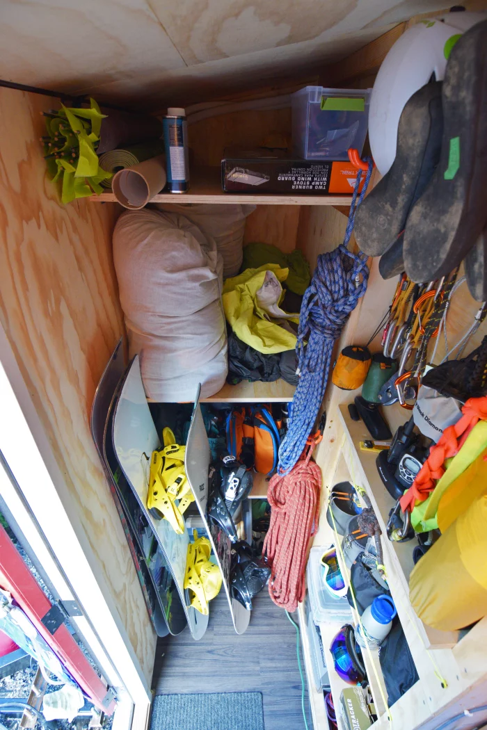 The externally-accessed gear room contains camping, kayaking, and related outdoors equipment