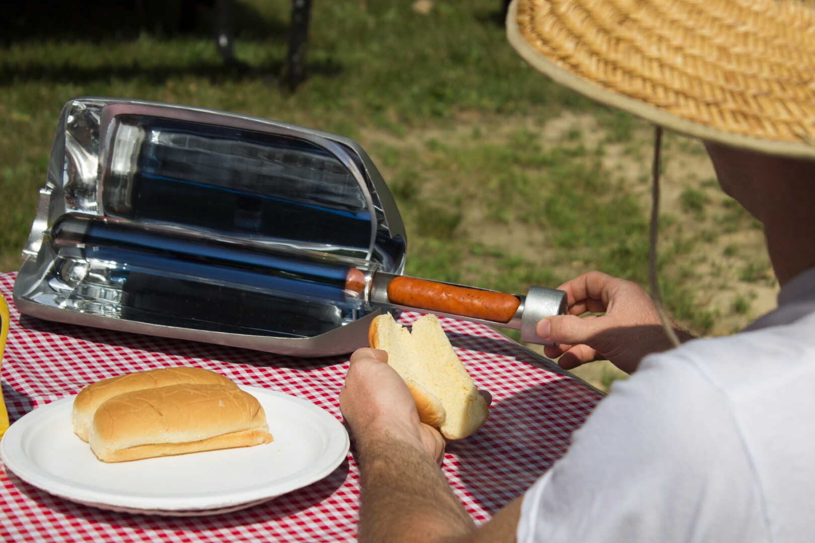 Solar powered hotdog cooker