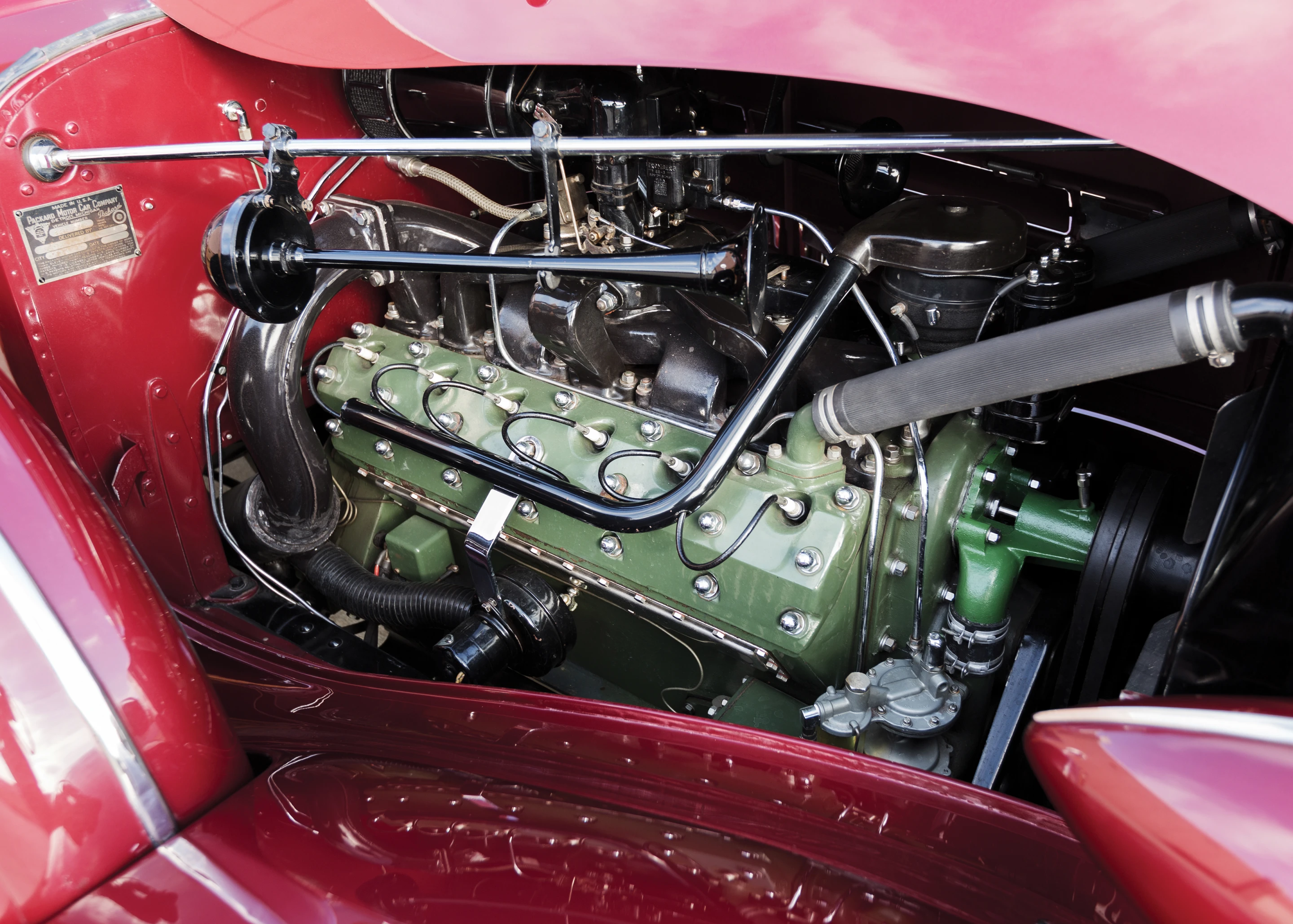 The Twelve Sport Phaeton runs on a 175 bhp, 473 cu. in. modified L-head V-12 engine, three-speed selective synchromesh manual transmission