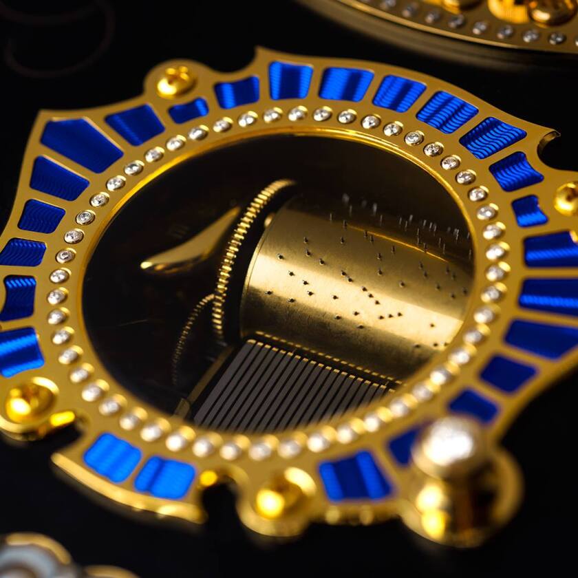 There's a piezo pickup in the Swiss-made replica of the watch's musical movement that's built into the instrument