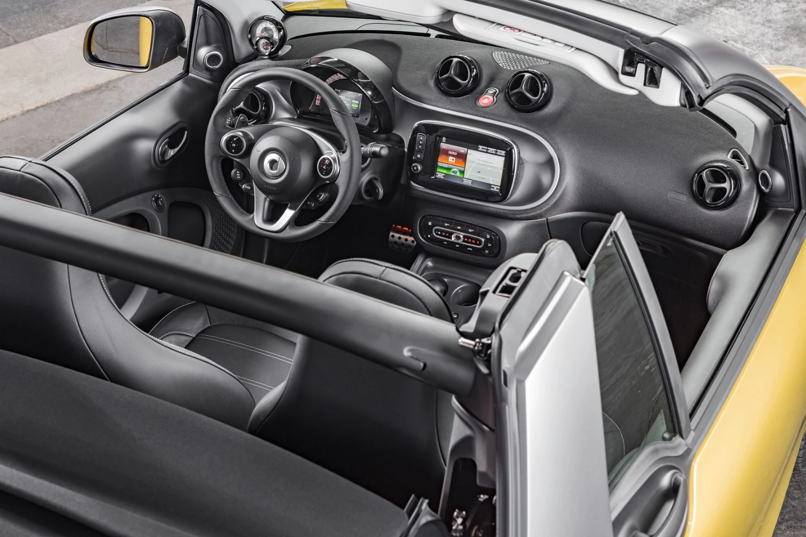 The Fortwo Cabrio has a center console with a drawer and coat hooks at the rear