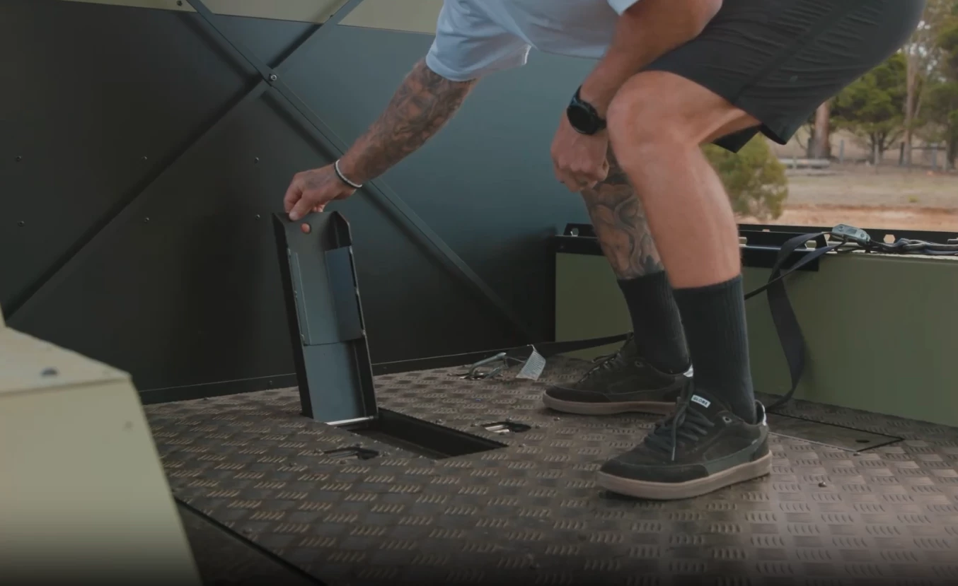 The floor-integrated wheel holders are ready when you need, folded flush when you don't