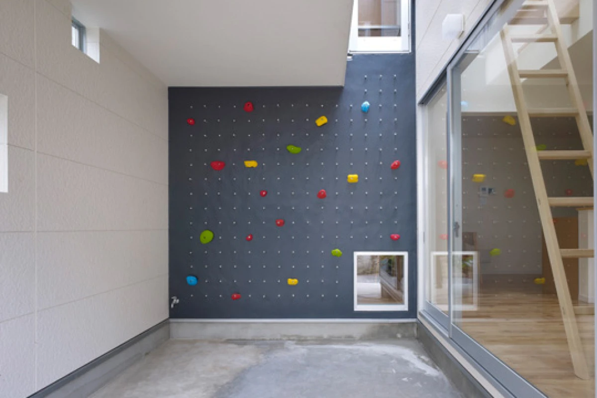 Located in a suburban area in Tokyo, 3way House is creative family home featuring a series of climbing walls and ladders