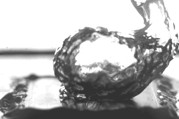 A plate that has received the surface treatment, in hot boiling action