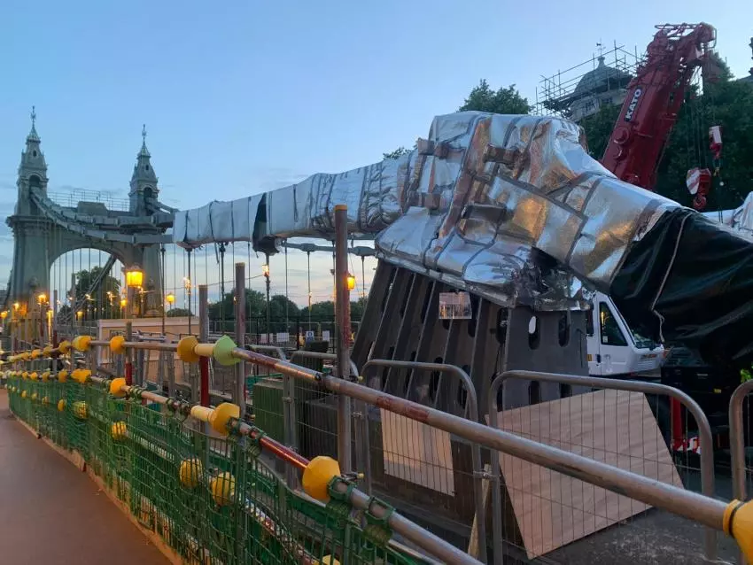 Parts of the Hammersmith bridge have been wrapped in foil to protect them from extreme heat