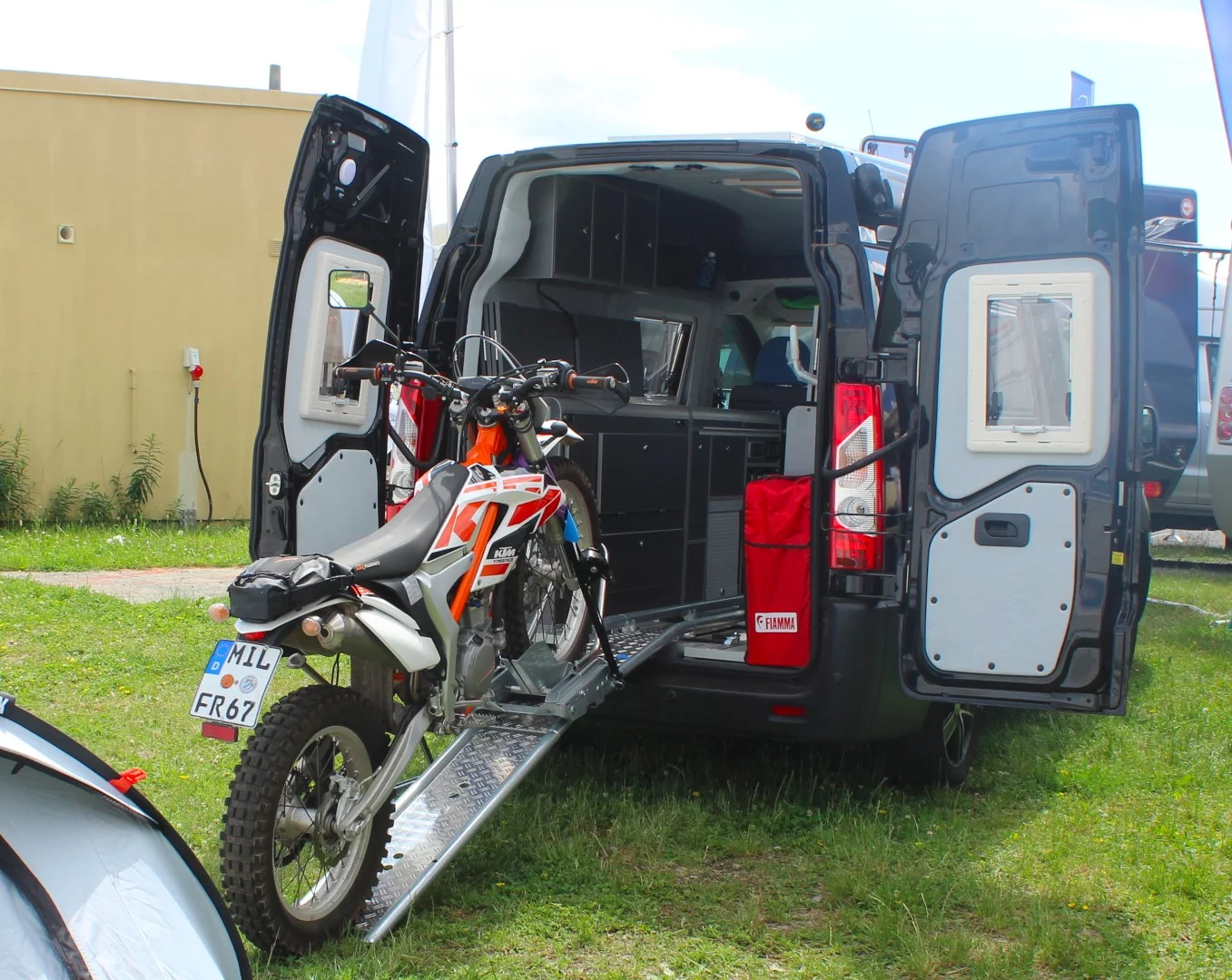 Our favorite Behl-Mobile of the bunch, this Fiat van is part bike hauler, part camper van