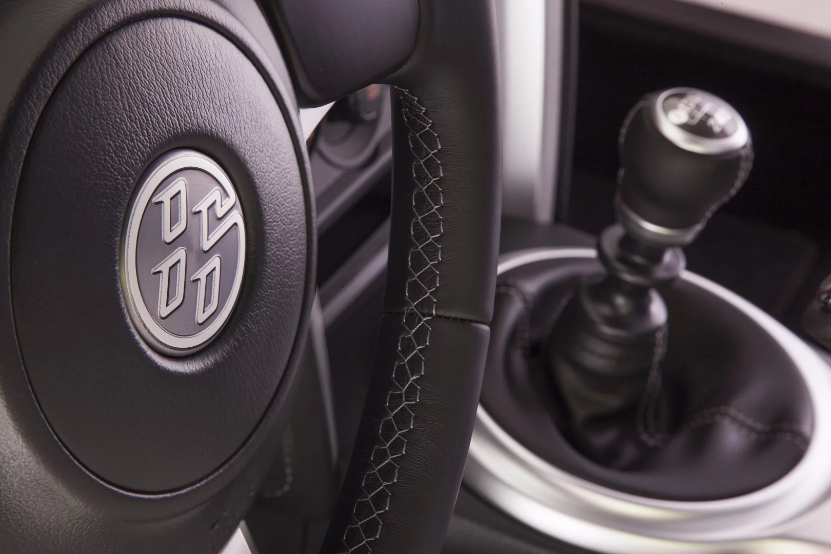 A six-speed manual transmission is standard and a six-speed automatic (which reduces engine output) is optional