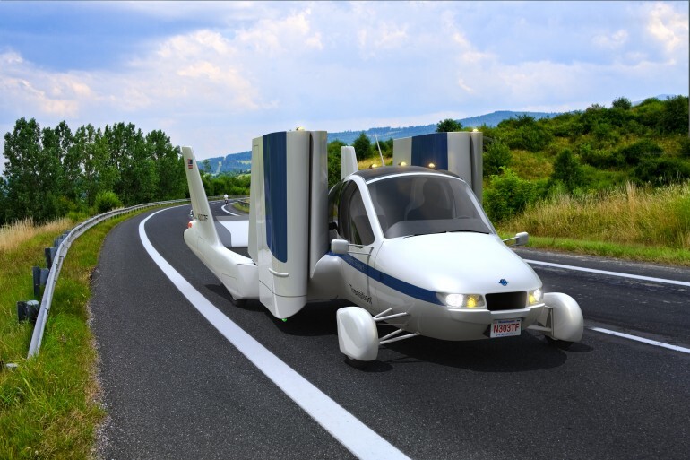 The Terrafugia Transition's wings fold into the body, allowing it to drive on the streets
