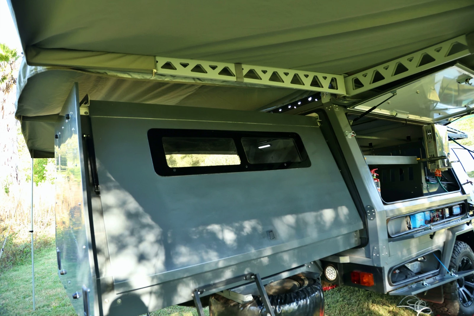 The available aluminum gullwing bedroom hatch door provides a little extra stoutness to the rear sleeper pod