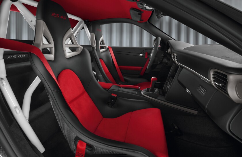 Internally, the Porsche 911 GT3 RS 4.0 comes ready to race with a half roll cage, seat belt harnesses, fire extinguisher, and a battery cut-off switch.
