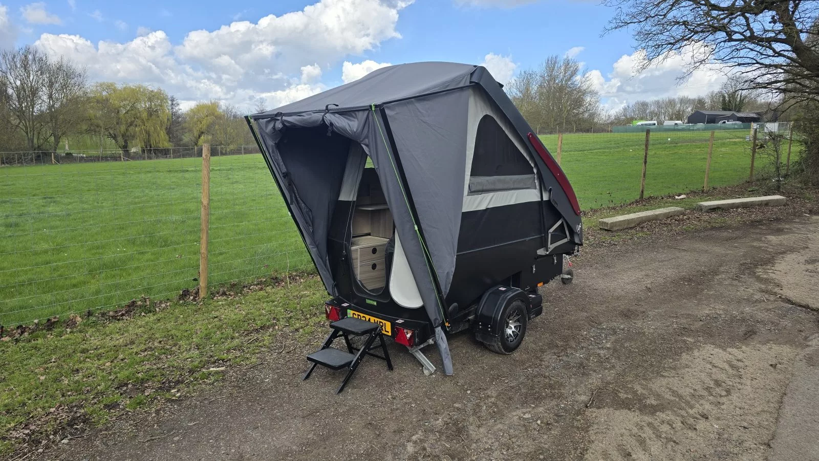 Dashaway ECT camper with awning tied back into sunshade form