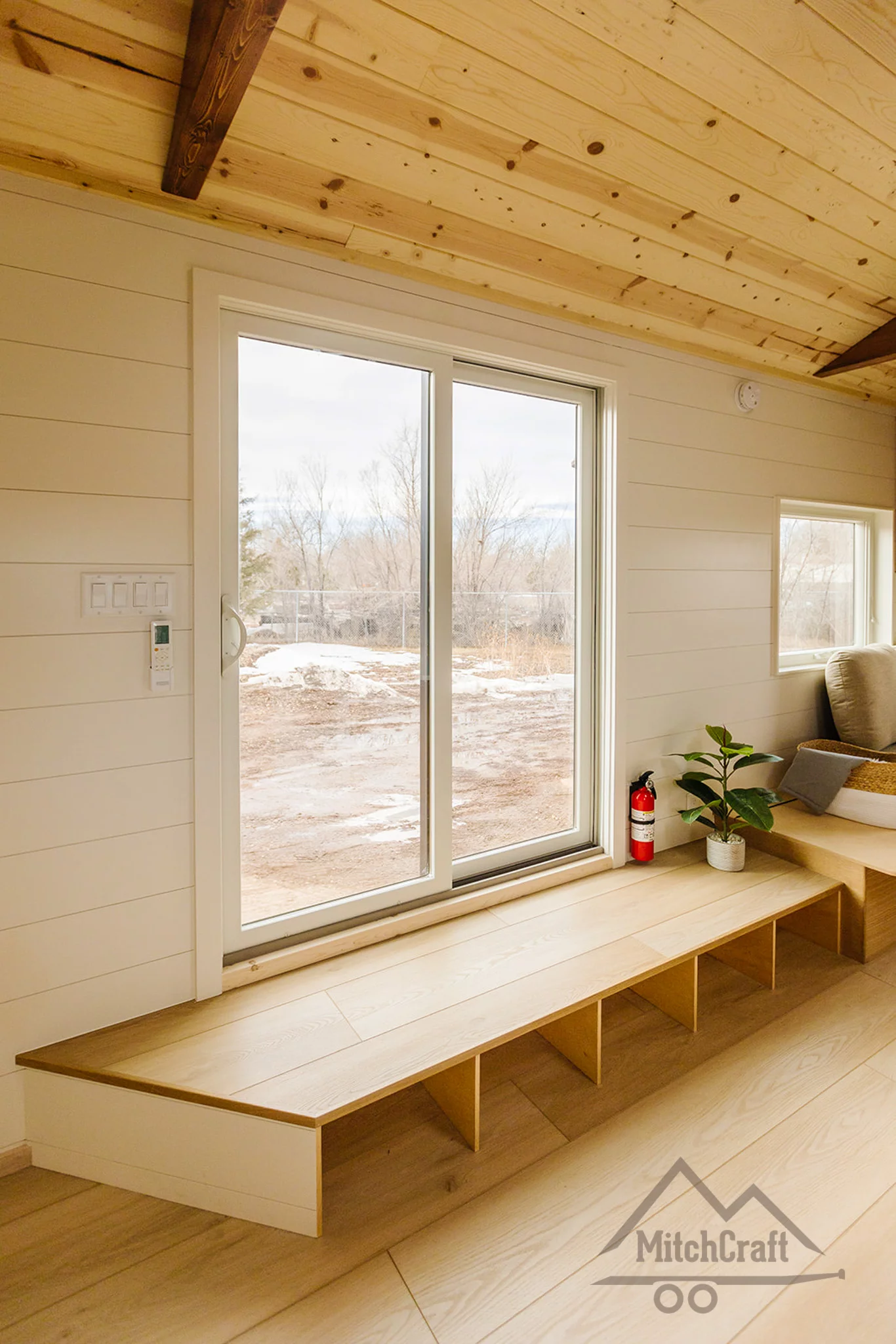 The CC 31' x 10' includes a step with some storage space in the kitchen area