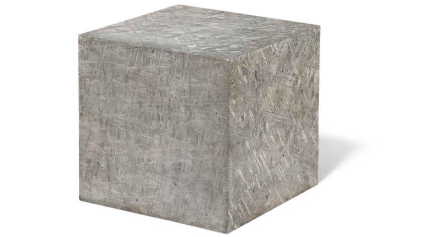 Extraterrestrial steel | Price: $31,741 (£25,000) | Auction Link | The Muonionalusta meteorite impacted in northern Scandinavia about one million years BCE. The first fragment was found in 1906 and around forty pieces are known today, of which this is one. Modern cutting has highlighted the meteorite's octahedrite crystalline fingerprint in three dimensions, resulting in a 13.1 kg cube with 4¾ inch (12cm) sides. This dense iron-nickel sculpture is in effect, extraterrestrial steel.