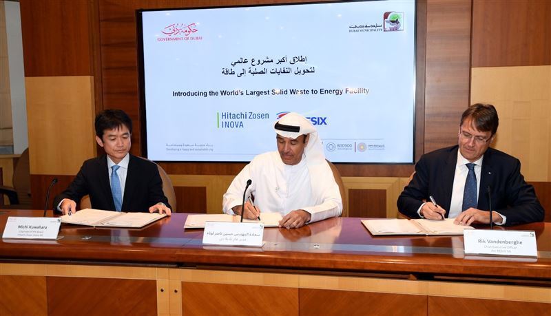 The directors of partner companies Hitachi Zosen Inova, Dubai Municipality and Besix Group, signing the agreement to build the world's largest waste-to-energy plant