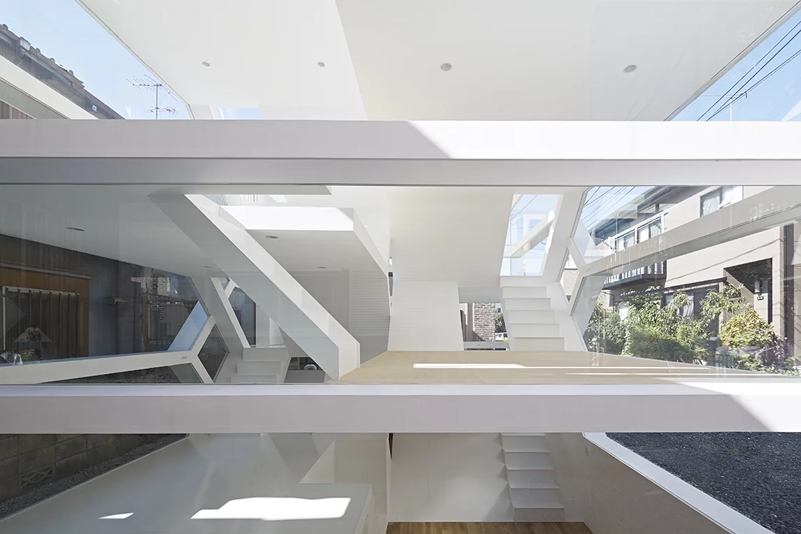 The home comprises several levels and half-levels (Photo: Koichi Torimura)