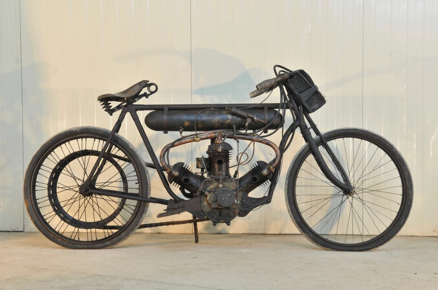 Alessandro Anzani is Italy's answer to Glen Curtiss, with both men riding motorcycles of their own manufacture in competition before going on to build massive companies around their engineering expertise. Anzani even made spare parts for Curtiss engines for many years. The engine in this motorcycle is not much different to the Anzani engine used by Louis Blériot to make the first flight across the English Channel in 1909. While Anzani was initially known for his 3-cylinder fan engines like the one above, he went on to make 2-, 3-, 4-, 5-, 6-, 7-, 10-, 14- and 20-cylinder engines in his factories in England, France and Italy, providing them to motorcycle manufacturers such as McEvoy, Montgomery, Cotton, and Greeves, while cars that used Anzani's engines included Morgan, AC, and Frazer-Nash. While the Anzani fetched nearly three times its estimate at $102,242(€ 83,440), another motorcycle on offer at Artcurial's official Retromobile auction with a three-cylinder fan layout caused a lot of interest, because the crankcase is clearly stamped as a Buchet, yet it is near identical to the Anzani and predates it by a year. The Buchet sold for €56,024 ($68,648), more than double its estimate.