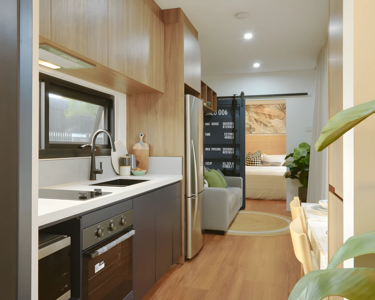 The Mark VI - VIC's kitchen has a fridge/freezer, an oven, an induction cooktop, microwave, and quite a lot of cabinetry