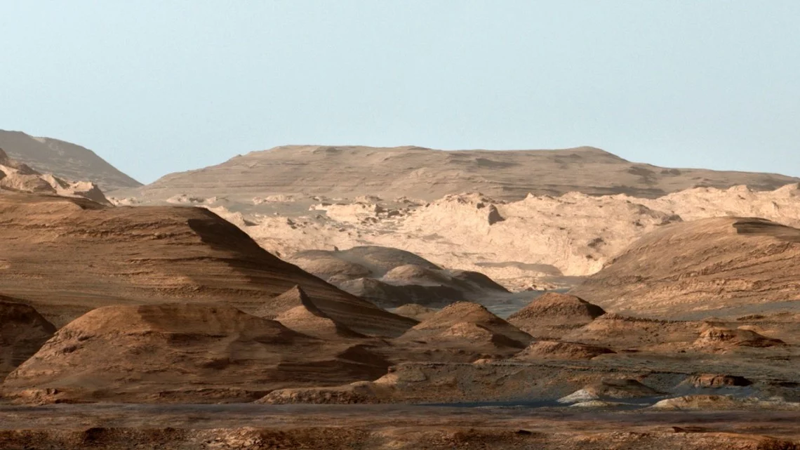 Mount Sharp in Gale Crater on Mars, falsely colored to highlight the different layers in the rock